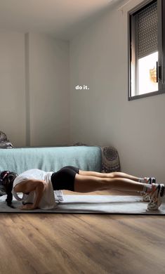 a woman is doing exercises on a yoga mat