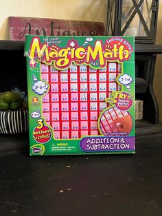 a game board sitting on top of a table next to a potted green plant