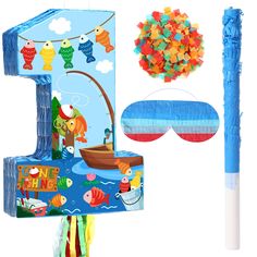 an assortment of toys and decorations for a child's birthday