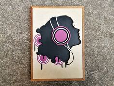 an abstract painting with pink and black circles