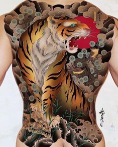 the back of a man's body with an image of a tiger on it