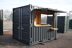 a portable kitchen made out of shipping containers