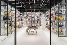 the inside of a shoe store with lots of shelves