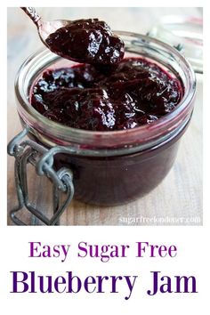 a spoon full of blueberry jam with the words easy sugar free blueberry jam