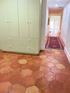 the hallway is clean and ready to be used as a room divider for storage