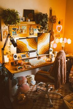 a computer desk with two monitors on top of it