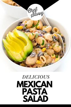 mexican pasta salad with avocado in a white bowl on a black and white background