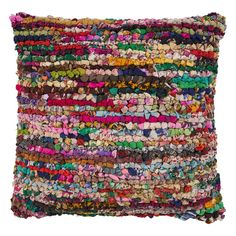 a multicolored pillow with buttons on it