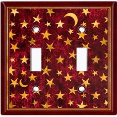 a red and gold light switch cover with stars