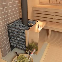 a room with a fireplace and some rocks on the floor