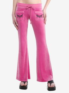 Bring back the 2000s with these pink velvet  low-rise  slightly flared lounge pants! From Sweet Society  they're decorated with black glitter butterflies on two front hip pockets and across the back. Drawstring  elasticated waist.97% rayon; 3% spandexWash cold; dry lowImportedListed in junior sizesModel is 5'10"Model wears size Small Cute Low Rise Pants, Sweet Society, Girls Lounge, Glitter Butterflies, Girls Loungewear, 2000s Clothes, Low Rise Pants, The 2000s, Y2k Pink