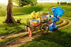 a blue teddy bear pushing a wagon filled with corn on the side of a dirt road