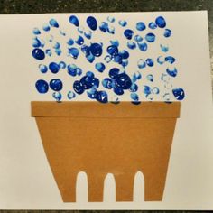 a card with blue and white bubbles in a pot