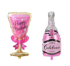 two pink and gold balloons in the shape of champagne bottles with happy birthday written on them