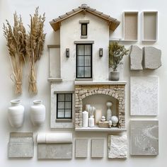 there are many white vases and other items on the wall