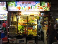 Hawker juice bar with big sign Fruit Bus Stop Japan, Food Court, Fruit