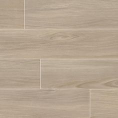 a white tile floor with wood grain pattern