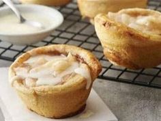 several small pies sitting on top of a cooling rack