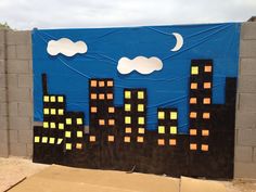 a paper city scene made out of cardboard and cut into the shape of a night sky