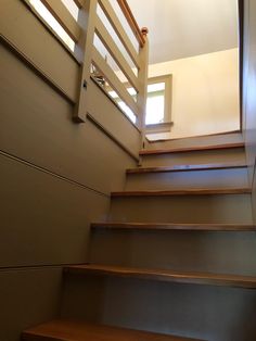 the stairs are made of wood and have no railings