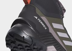 the adidas are designed to look like they're wearing hiking boots with rubber outs