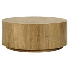 a round wooden table sitting on top of a white background