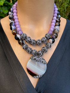 Chunky big bold agate stone and purple lepidolite stone agate pendant statement necklace is perfect for women who likes to sparkle on their daily lives, special occasions, weddings, parties and birthdays.  You can choose this necklace for your mother , partner , girl friend as a special gift. It will bring glamor to your all styles Necklace Details Handmade item.  📐Lenght is 45 cm  📐10 cm adjustable chain. You can adjust lenght.  📐Gemstone sizes:14 mm Agate Stone Faceted Sphere,10 mm Lepidoli Elegant Purple Agate Beaded Necklaces, Elegant Purple Agate Beaded Necklace, Modern Necklace, 50th Birthday Gifts, Modern Necklaces, Chunky Necklace, Layered Necklace, Agate Pendant, Etsy Jewelry