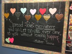 a chalkboard with hearts hanging from it's sides and the words spread love everywhere you go, let no one ever come to you without leaving happiness