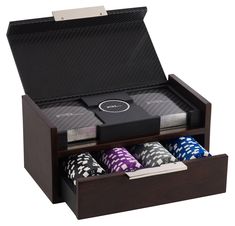 a wooden box with four poker chips in it and two dice holders on each side