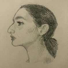 a pencil drawing of a woman's profile