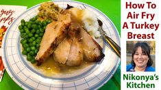 a plate with meat, peas and mashed potatoes on it next to a cookbook