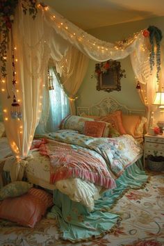 a canopy bed is decorated with fairy lights