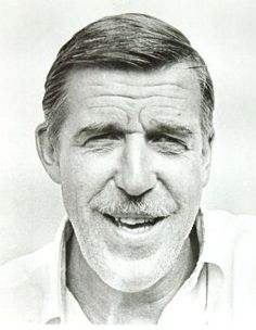 an old black and white photo of a man with a moustache on his face