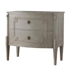 a silver chest with two drawers on one side and an ornate design on the other