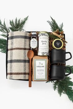 the holiday hamper is packed with coffee, jams and other items to make it festive