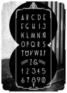 a black and white photo of an alphabet sign