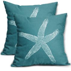 two blue pillows with white starfishs on the front and back, one in turquoise