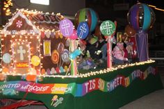 a float decorated with christmas lights and decorations