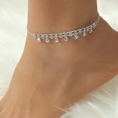 ✦ Add some sparkle to your summer look with our Dainty Rhinestone Silver Anklet Chain. This beautiful ankle bracelet features a delicate silver chain adorned with sparkling rhinestones, giving you a simple yet elegant look. Perfect for any occasion, this satellite anklet is both glamorous and versatile, making it a great addition to your summer jewelry collection. Crafted with high-quality materials, this anklet is both durable and stylish. Whether you're wearing sandals or flip-flops, this dain Anklet Chain, Anklet For Women, Heart Anklet, Pearl Anklet, Silver Anklet, Basic Jewelry, Crystal Hoop Earrings, Nose Rings Hoop, Silver Anklets