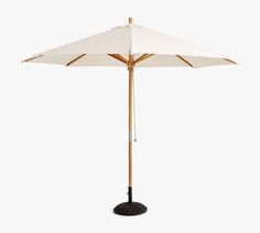 an umbrella that is standing up against a white background, with the top half open