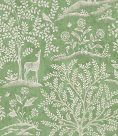 a green wallpaper with white deer and trees