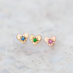 SINGLE STUDS made to mix and match. Sweet mini heart studs star set with a blue sapphire. Earrings measure 5 x 4.2 mm Weight 0.2g (approximately) Please note this is for one earring, to order a pair, add two at checkout.