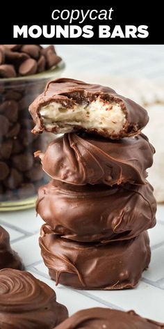 chocolate covered desserts stacked on top of each other with the words copycat mounds bars in