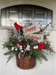 a holiday basket hanging on the front door