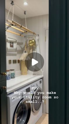 a washer sitting inside of a kitchen next to a dryer