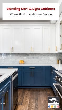 a kitchen with white and blue cabinets, wood flooring and stainless steel appliances in it