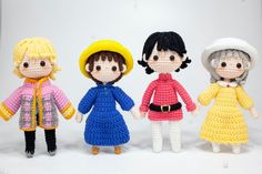 three crocheted dolls are standing next to each other in different outfits and hats