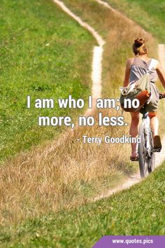 a woman riding a bike down a dirt road with a quote on it saying i am who i am, no more, no less