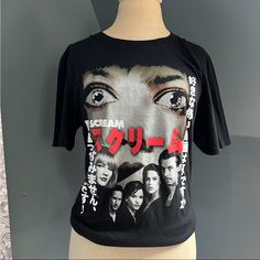 a mannequin wearing a t - shirt with an image of the faces of actors on it