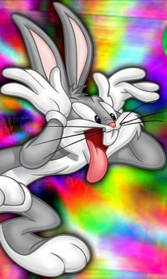 an image of a cartoon character with tongue out and eyes wide open in front of multicolored background